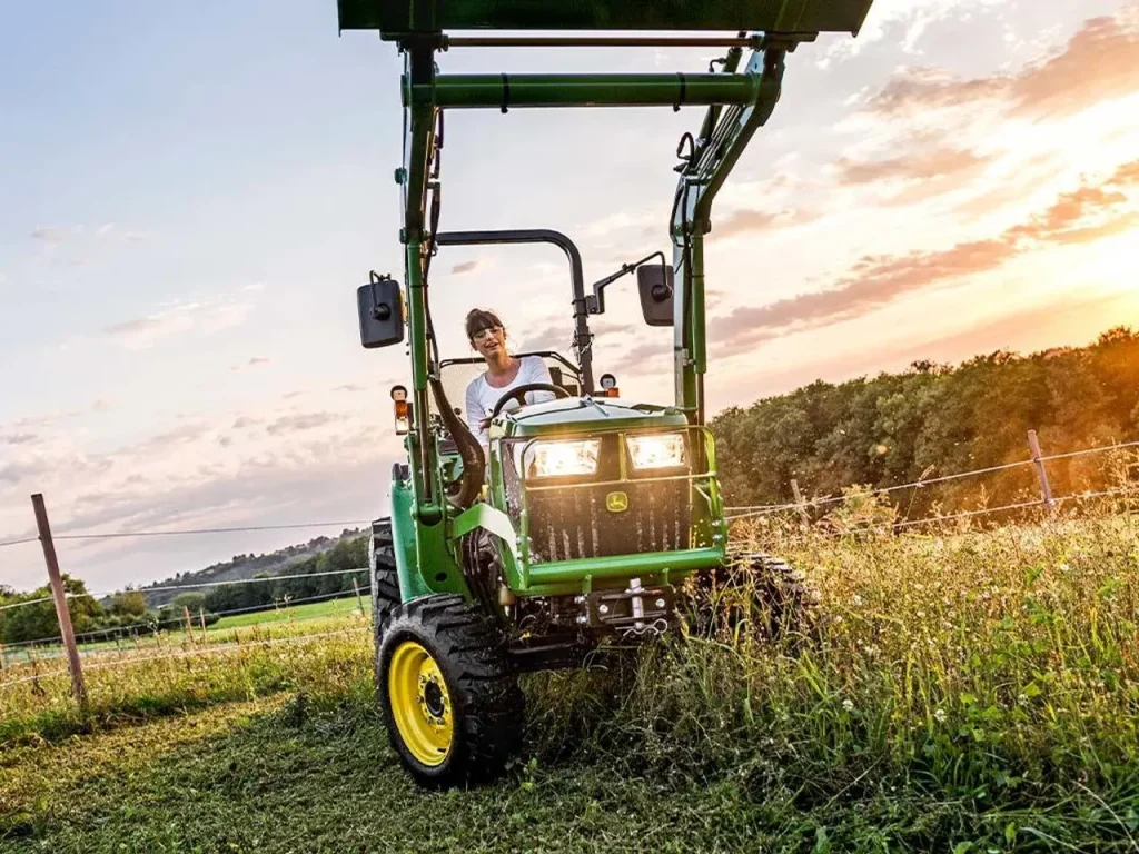Folding ROPS roll bar on an open-station John Deere 3038E compact tractor